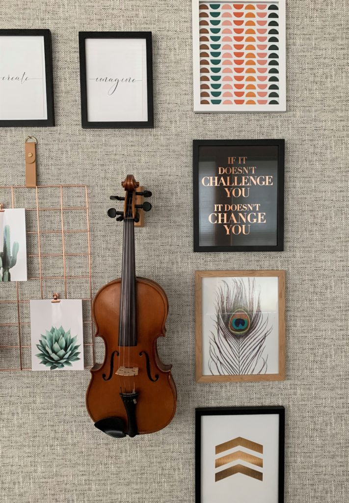 Gallery Wall with violin and hanging images